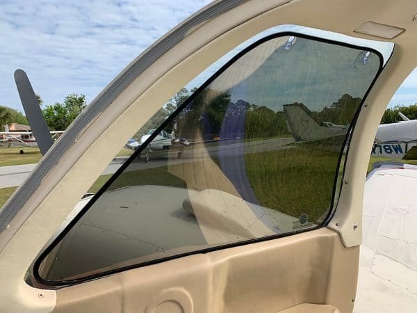 Beechcraft Co-Pilot Side Window with Universal Jet Shade installed.