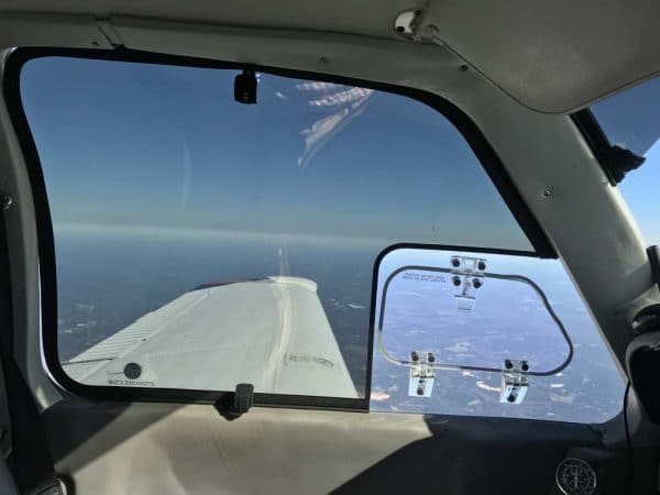 Baron Pilot Side Window in-flight with Custom Jet Shades
